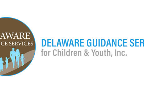 DGS-Logo-social-logo - NAMI Delaware Guidance Services logo on a blue banner featuring a brown circle with a family silhouettes motif in light blue.