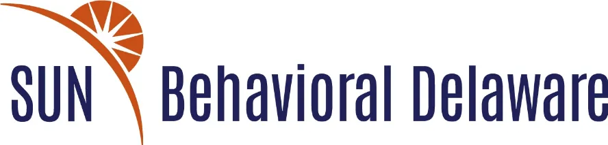 SUN Behavioral Delaware logo with an orange sun arc and blue text reading 'SUN Behavioral Delaware'